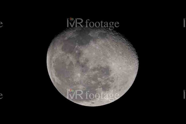 A close-up of moon in the dark sky - WM