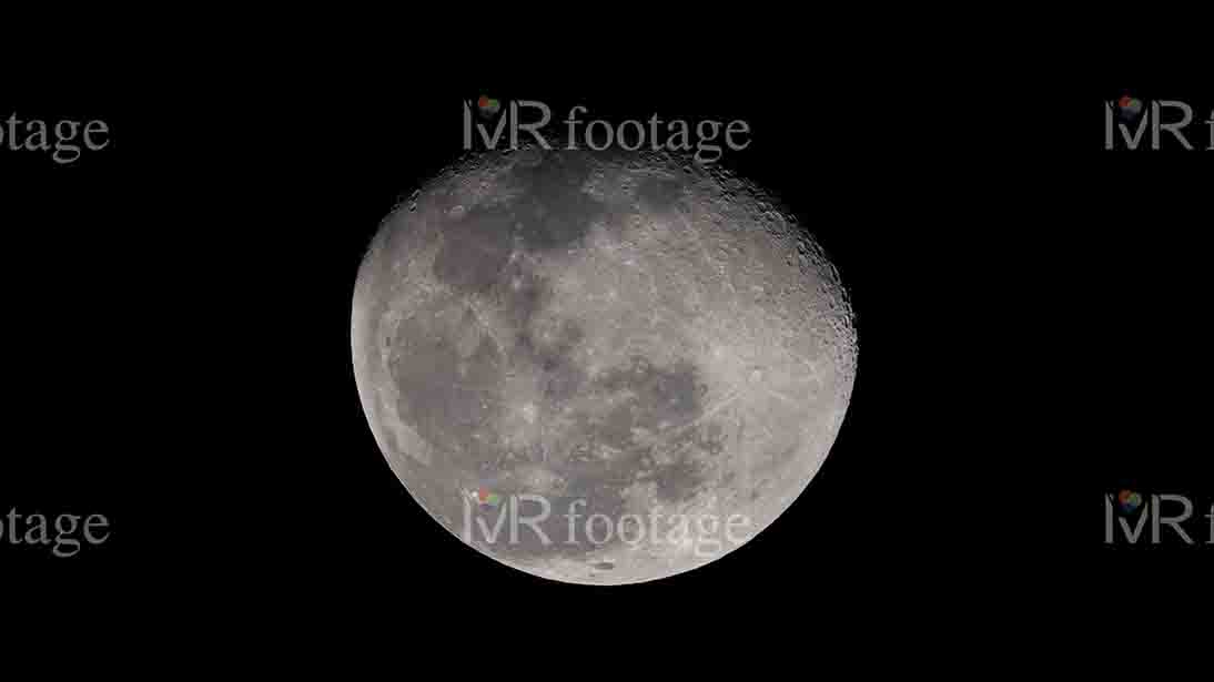 A close-up of moon in the dark sky - WM